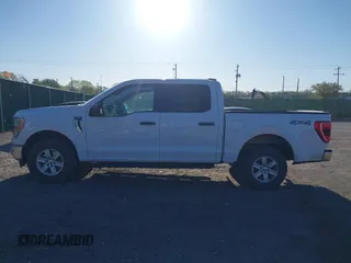 2021 Ford F-150 XL with VIN 1FTEW1EP5MKE25613, listed as a IAAI auction lot 42028237 with 116,341 mi miles. Bid and sale history available at carsss.com. Image 14.