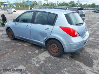 2012 Nissan Versa S with VIN 3N1BC1CP5CK216103, listed as a IAAI auction lot 41992781 with 111,821 mi miles. Bid and sale history available at carsss.com. Image 3.