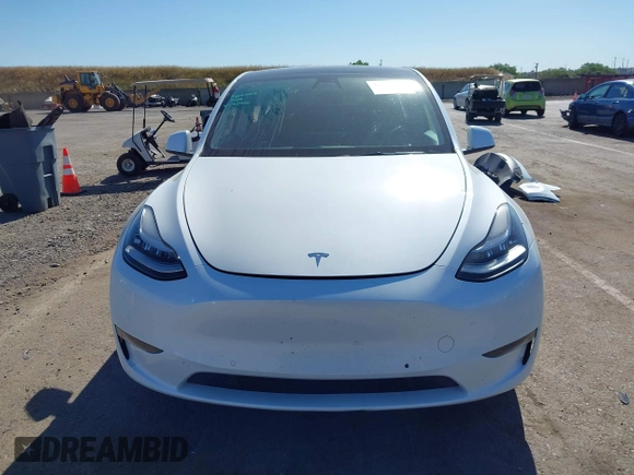 2022 Tesla Model Y Long Range with VIN 7SAYGDEE1NF364241, listed as a IAAI auction lot 42190272 with 54,878 mi miles and . Bid and sale history available at DreamBid. Image 12.