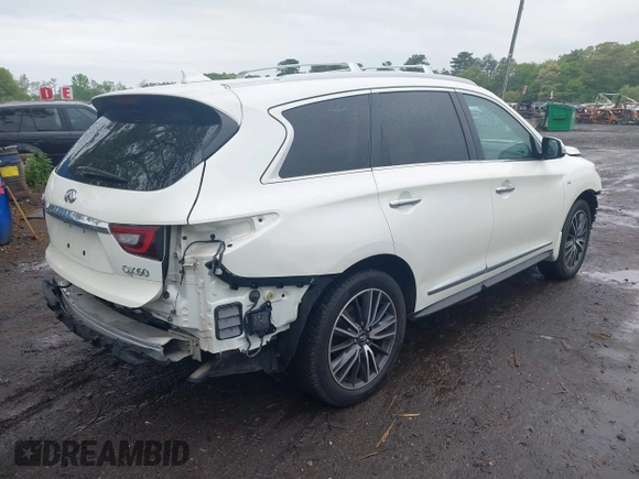 2020 Infiniti QX60 Luxe with VIN 5N1DL0MM7LC547819, listed as a IAAI auction lot 42271117 with 73,253 mi miles and . Bid and sale history available at DreamBid. Image 4.