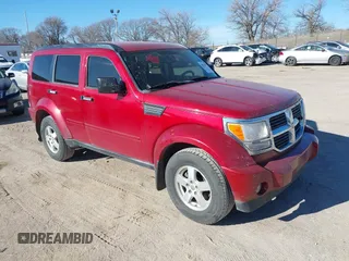2009 Dodge Nitro SXT with VIN 1D8GU28K09W504936, listed as a IAAI auction lot 40761972 with 86,017 mi miles. Bid and sale history available at carsss.com. Image 1.