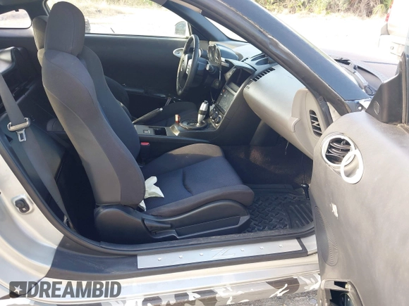 2004 Nissan 350Z Touring with VIN JN1AZ34D44T150578, listed as a IAAI auction lot 41907783 with 198,312 mi miles. Bid and sale history available at carsss.com. Image 5.