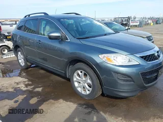 2011 Mazda CX-9 Touring z VIN JM3TB3CV6B0308283, wystawiony jako IAAI lot #41739538 z przebiegiem 96 507 mil mil oraz . Historia ofert i sprzedaży dostępna na DreamBid. Obrazek 1.
