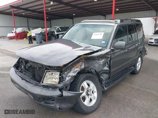 2004 Toyota Land Cruiser with VIN JTEHT05JX42059414, listed as a IAAI auction lot 41919791 with 210,528 mi miles. Bid and sale history available at carsss.com. Image 2.