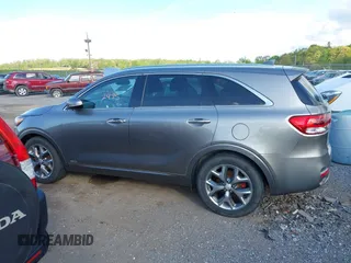 2016 Kia Sorento SX with VIN 5XYPKDA51GG031823, listed as a IAAI auction lot 42142495 with 87,132 mi miles. Bid and sale history available at carsss.com. Image 14.