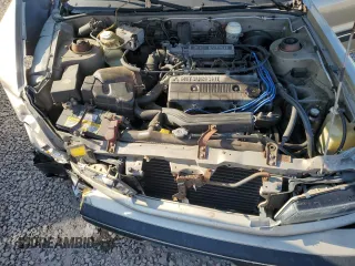 1989 Mitsubishi Galant with VIN JA3BR56V1KZ052149, listed as a Copart auction lot 69987544 with 74,232 mi miles and Salvage Title. Bid and sale history available at DreamBid. Image 11.