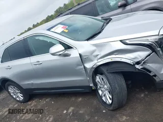 2019 Cadillac XT4 FWD Luxury z VIN 1GYAZAR43KF160132, wystawiony jako IAAI lot #41941512 z przebiegiem 68 835 mil mil oraz . Historia ofert i sprzedaży dostępna na DreamBid. Obrazek 13.
