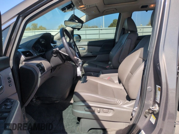 2014 Honda Odyssey Touring with VIN 5FNRL5H95EB052523, listed as a Copart auction lot 52214055 with 131,350 mi miles and Salvage Title. Bid and sale history available at DreamBid. Image 7.