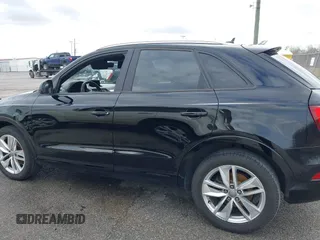 2018 Audi Q3 Premium z VIN WA1BCCFS8JR013032, wystawiony jako IAAI lot #41706173 z przebiegiem 111 402 mil mil oraz . Historia ofert i sprzedaży dostępna na DreamBid. Obrazek 14.