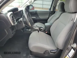 2018 Toyota Tacoma SR5 с VIN 5TFAZ5CN3JX071474, выставлен на аукционе Copart как лот 54677335 с пробегом 86 866 миль миль и Списание • Salvage title. История ставок и продаж доступна на DreamBid. Изображение 7.