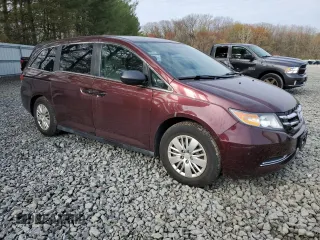 2014 Honda Odyssey LX with VIN 5FNRL5H29EB133074, listed as a Copart auction lot 52322725 with 44,804 mi miles and Salvage Title. Bid and sale history available at DreamBid. Image 4.