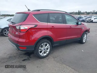 2018 Ford Escape SE z VIN 1FMCU9GD8JUB14803, wystawiony jako IAAI lot #41842056 z przebiegiem 50 712 mil mil oraz . Historia ofert i sprzedaży dostępna na DreamBid. Obrazek 4.