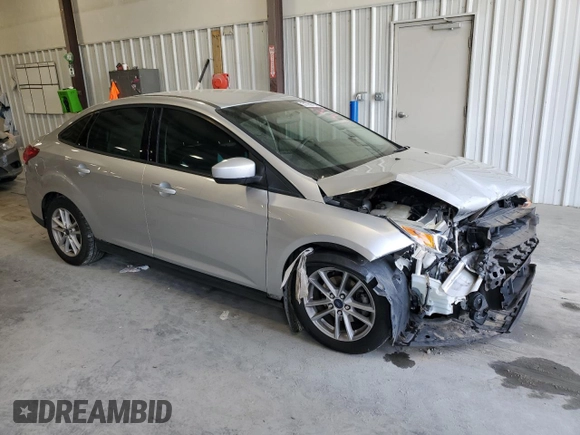 2018 Ford Focus SE z VIN 1FADP3FE9JL234158, wystawiony jako Copart lot #51788755 z przebiegiem 99 877 mil mil oraz Szkoda całkowita • Salvage title. Historia ofert i sprzedaży dostępna na DreamBid. Obrazek 4.
