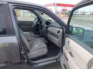 2014 Honda Pilot EX-L with VIN 5FNYF3H50EB017733, listed as a IAAI auction lot 41370236 with 133,211 mi miles. Bid and sale history available at carsss.com. Image 5.