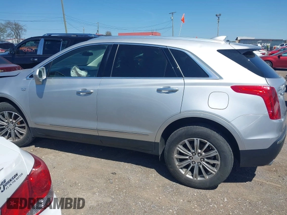 2017 Cadillac XT5 Luxury FWD z VIN 1GYKNBRS6HZ231609, wystawiony jako IAAI lot #42043791 z przebiegiem 106 594 mil mil oraz . Historia ofert i sprzedaży dostępna na DreamBid. Obrazek 14.