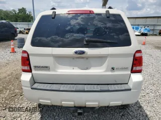 2009 Ford Escape Hybrid with VIN 1FMCU59309KC19243, listed as a Copart auction lot 61416915 with 74,732 mi miles and Salvage title. Bid and sale history available at DreamBid. Image 6.