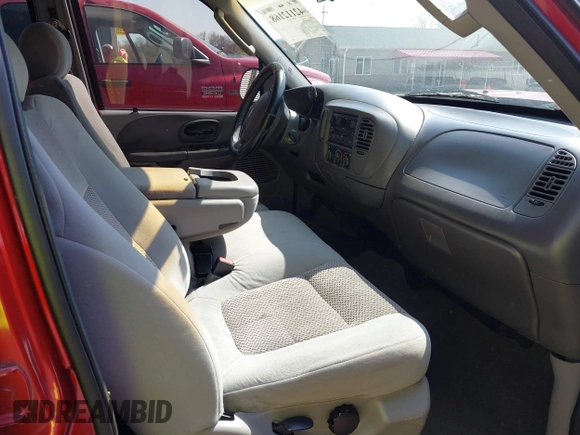 2003 Ford F-150 XLT with VIN 1FTRW07L13KD81923, listed as a IAAI auction lot 42112168 with 147,039 mi miles. Bid and sale history available at carsss.com. Image 5.