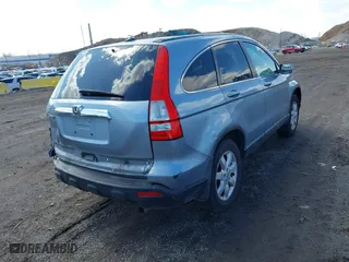 2009 Honda CR-V EX-L with VIN 5J6RE48799L065209, listed as a IAAI auction lot 41868398 with 111,385 mi miles. Bid and sale history available at carsss.com. Image 4.