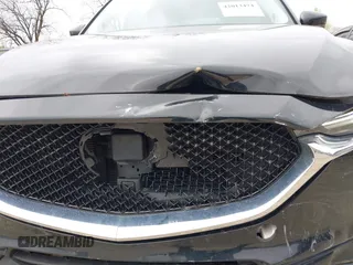 2018 Mazda CX-5 Grand Touring with VIN JM3KFBDM3J0384431, listed as a IAAI auction lot 42013474 with 65,018 mi miles. Bid and sale history available at carsss.com. Image 17.