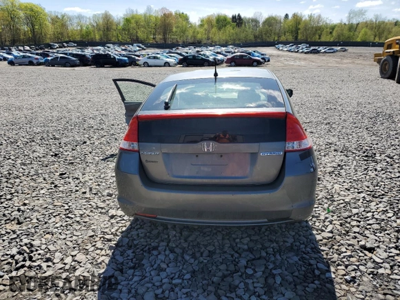 2010 Honda Insight LX z VIN JHMZE2H59AS000085, wystawiony jako Copart lot #54932975 z przebiegiem 218 961 mil mil oraz Szkoda całkowita • Salvage title. Historia ofert i sprzedaży dostępna na DreamBid. Obrazek 6.