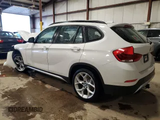 2013 BMW X1 xDrive28i z VIN WBAVL1C58DVR85843, wystawiony jako Copart lot #57589125 z przebiegiem 102 198 mil mil oraz Szkody całkowita. Historia ofert i sprzedaży dostępna na DreamBid. Obrazek 2.