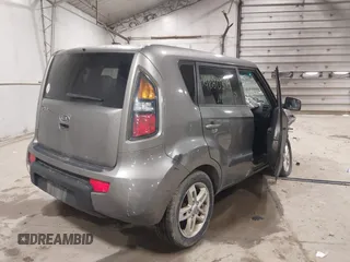 2011 Kia Soul + with VIN KNDJT2A23B7317367, listed as a IAAI auction lot 41880399 with 186,736 mi miles. Bid and sale history available at carsss.com. Image 4.