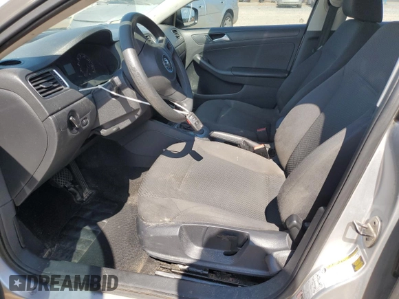 2014 Volkswagen Jetta S with VIN 3VW2K7AJ1EM289975, listed as a Copart auction lot 65003635 with 135,286 mi miles and Clean title. Bid and sale history available at DreamBid. Image 7.