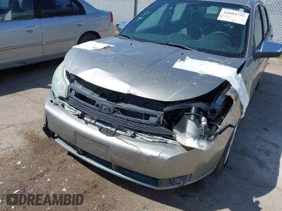 2008 Ford Focus SE z VIN 1FAHP35N78WZ94676, wystawiony jako IAAI lot #42094725 z przebiegiem 106 353 mil mil oraz . Historia ofert i sprzedaży dostępna na DreamBid. Obrazek 6.