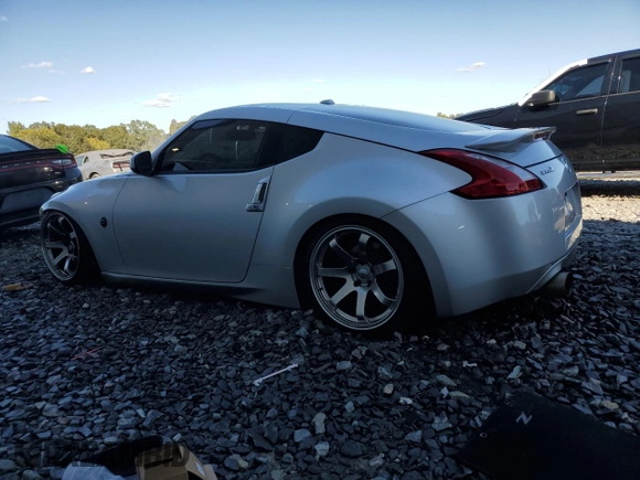 2010 Nissan 370Z with VIN JN1AZ4EH7AM500282, listed as a Copart auction lot 76578084 with 65,773 mi miles and Salvage Title. Bid and sale history available at DreamBid. Image 2.
