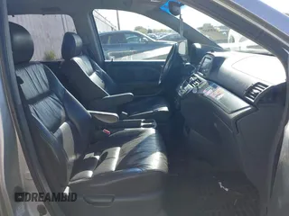 2005 Honda Odyssey TOURING with VIN 5FNRL38855B069043, listed as a IAAI auction lot 42035153 with 236,533 mi miles. Bid and sale history available at carsss.com. Image 5.