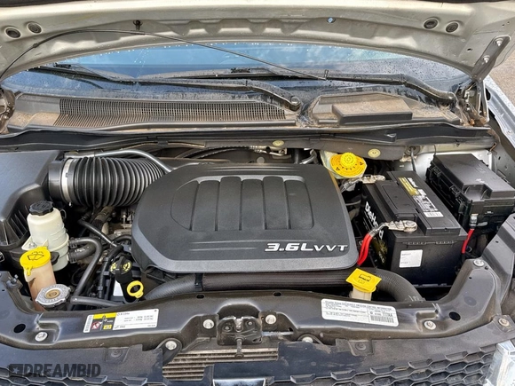 2015 Dodge Grand Caravan SXT with VIN 2C4RDGCG8FR548324, listed as a Copart auction lot 50900295 with 148,068 mi miles and Clean Title. Bid and sale history available at carsss.com. Image 7.