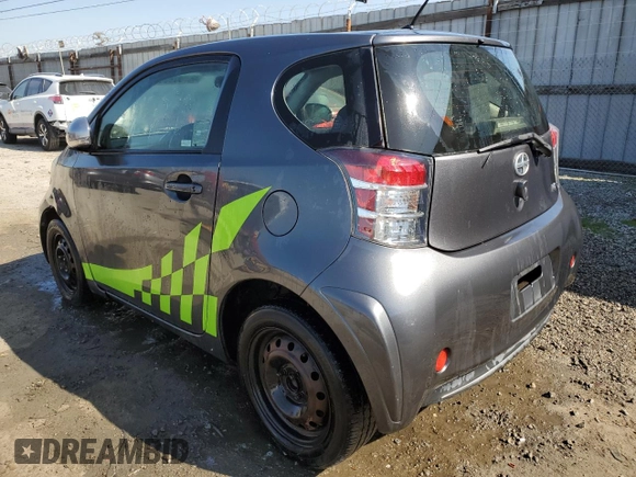 2014 Scion iQ with VIN JTNJJXB0XEJ029610, listed as a Copart auction lot 46700905 with 135,381 mi miles and Salvage title. Bid and sale history available at DreamBid. Image 2.