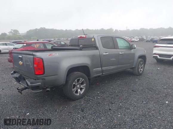 2018 Chevrolet Colorado 4WD Z71 with VIN 1GCGTDEN3J1327344, listed as a IAAI auction lot 42471944 with 153,499 mi miles and . Bid and sale history available at DreamBid. Image 4.