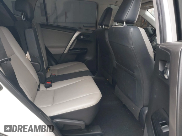 2016 Toyota RAV4 Limited with VIN JTMYFREV2GJ065656, listed as a IAAI auction lot 42575320 with 124,648 mi miles and . Bid and sale history available at DreamBid. Image 8.