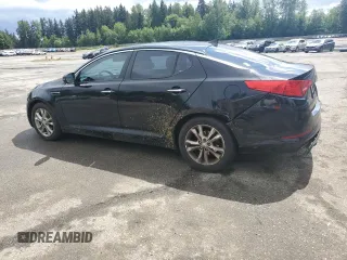 2013 Kia Optima LX z VIN 5XXGM4A79DG144608, wystawiony jako Copart lot #57461585 z przebiegiem 120 677 mil mil oraz Szkoda całkowita • Salvage title. Historia ofert i sprzedaży dostępna na DreamBid. Obrazek 2.