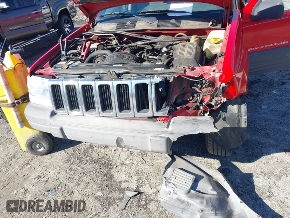 1996 Jeep Grand Cherokee Laredo with VIN 1J4EX58S8TC122302, listed as a IAAI auction lot 41218573 with 195,392 mi miles. Bid and sale history available at carsss.com. Image 6.