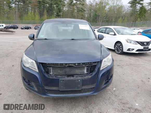 2011 Volkswagen Tiguan SE with VIN WVGBV7AX3BW511017, listed as a IAAI auction lot 42222868 with 120,955 mi miles and . Bid and sale history available at DreamBid. Image 6.