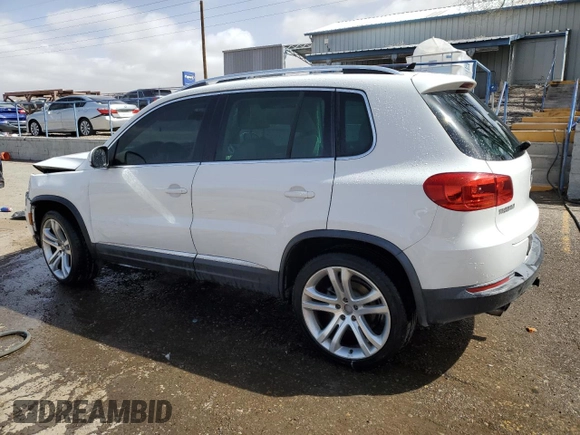 2012 Volkswagen Tiguan SE with VIN WVGAV7AX1CW530016, listed as a Copart auction lot 48551935 with 102,455 mi miles and Salvage Title. Bid and sale history available at DreamBid. Image 2.