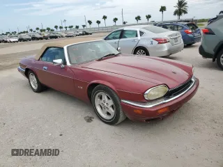 1995 Jaguar XJS with VIN SAJNX2742SC197388, listed as a Copart auction lot 76579714 with 99,077 mi miles and Salvage Title. Bid and sale history available at carsss.com. Image 4.
