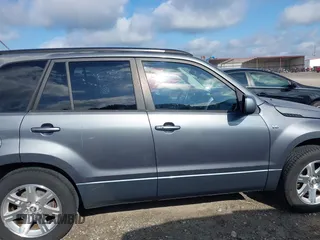 2006 Suzuki Grand Vitara Luxury z VIN JS3TE947864103082, wystawiony jako IAAI lot #42470917 z przebiegiem 155 702 mil mil oraz . Historia ofert i sprzedaży dostępna na DreamBid. Obrazek 14.