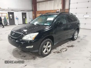 2004 Lexus RX with VIN 2T2HA31U74C036035, listed as a IAAI auction lot 42195070 with 200,689 mi miles. Bid and sale history available at carsss.com. Image 2.