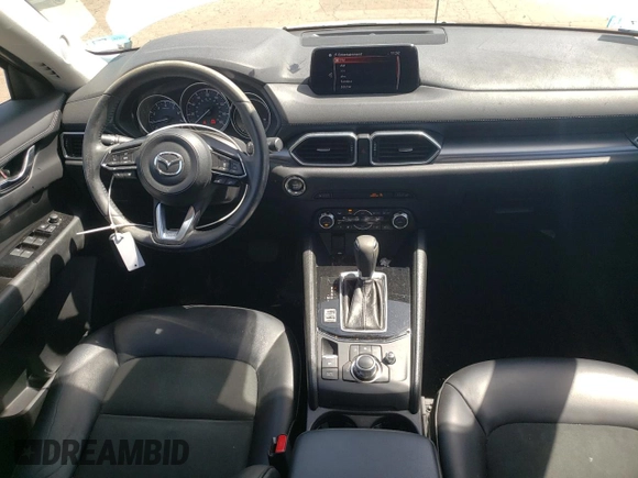2018 Mazda CX-5 Touring with VIN JM3KFBCMXJ0389773, listed as a Copart auction lot 54737795 with 82,103 mi miles and Salvage Title. Bid and sale history available at DreamBid. Image 8.