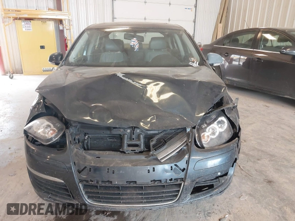 2006 Volkswagen Jetta 1.9L TDI z VIN 3VWDT71K26M624953, wystawiony jako IAAI lot #42420386 z przebiegiem 161 686 mil mil oraz . Historia ofert i sprzedaży dostępna na DreamBid. Obrazek 12.