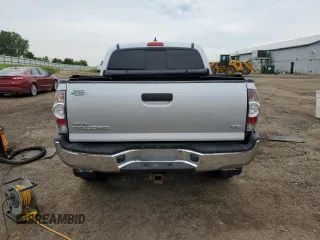 2012 Toyota Tacoma z VIN 3TMLU4EN6CM093217, wystawiony jako Copart lot #60237655 z przebiegiem 184 205 mil mil oraz Czysty tytuł • Clean title. Historia ofert i sprzedaży dostępna na DreamBid. Obrazek 6.