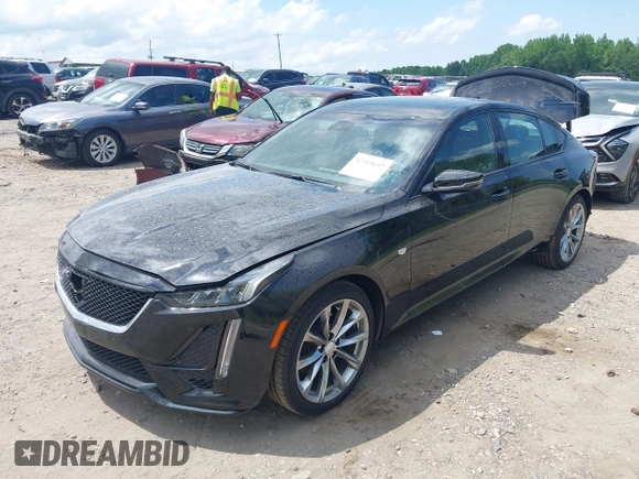2024 Cadillac CT5 Sport z VIN 1G6DP5RK3R0127081, wystawiony jako IAAI lot #42319697 z przebiegiem 4 093 mil mil oraz . Historia ofert i sprzedaży dostępna na DreamBid. Obrazek 19.