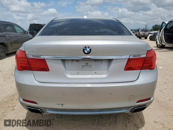 2012 BMW 7 Series 740i with VIN WBAKA4C5XCC613599, listed as a Copart auction lot 62951835 with 102,534 mi miles and Clean title. Bid and sale history available at DreamBid. Image 6.