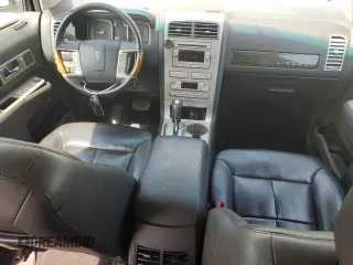 2007 Lincoln MKX z VIN 2LMDU88C47BJ24008, wystawiony jako Copart lot #60065225 z przebiegiem 157 038 mil mil oraz Czysty tytuł • Clean title. Historia ofert i sprzedaży dostępna na DreamBid. Obrazek 8.