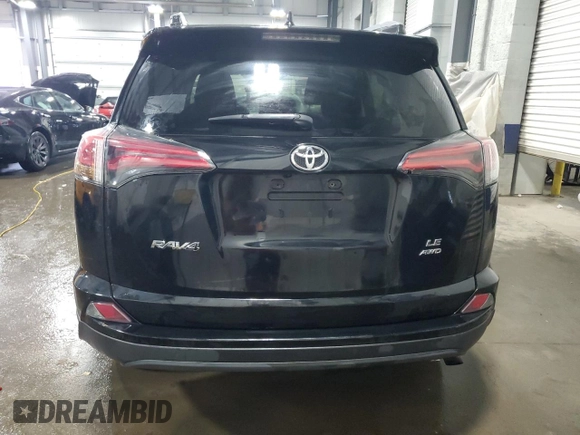 2017 Toyota RAV4 LE with VIN 2T3BFREV3HW617738, listed as a Copart auction lot 58712515 with 117,310 mi miles and Salvage title. Bid and sale history available at DreamBid. Image 6.