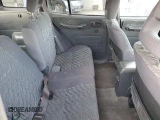 1999 Toyota RAV4 with VIN JT3GP10V9X7042801, listed as a Copart auction lot 82712874 with 256,151 mi miles and Salvage Title. Bid and sale history available at DreamBid. Image 10.