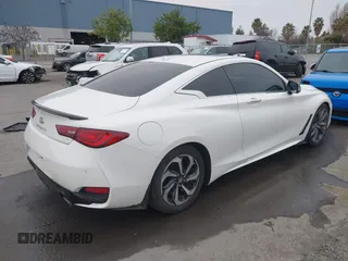 2021 Infiniti Q60 Red Sport 400 with VIN JN1FV7LK1MM530013, listed as a IAAI auction lot 41461752 with 52,844 mi miles and . Bid and sale history available at DreamBid. Image 4.